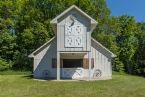 Board & Batten Outbuilding - Country homes for sale and luxury real estate including horse farms and property in the Caledon and King City areas near Toronto
